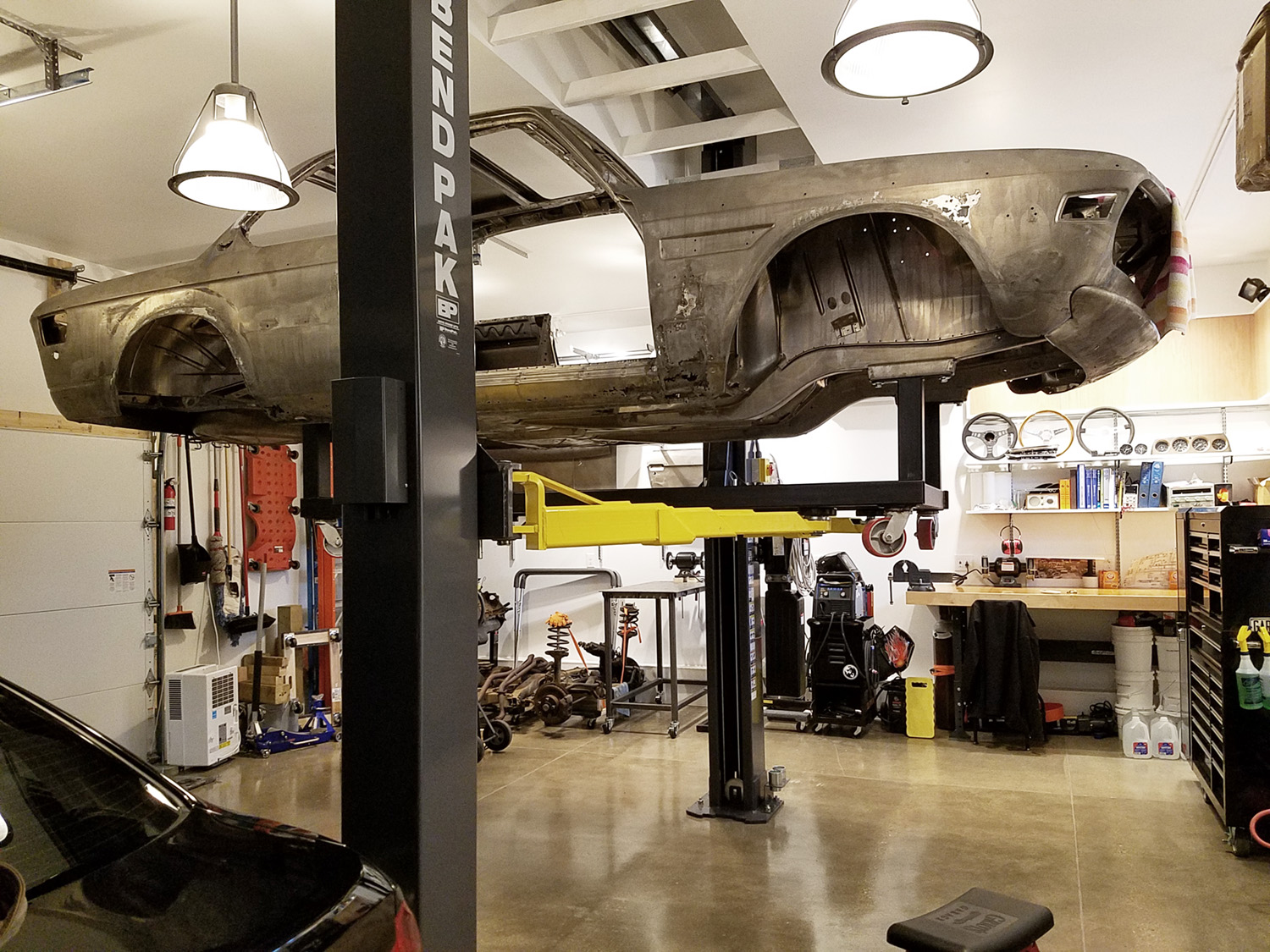 20201028-car on dolly on lift.jpg