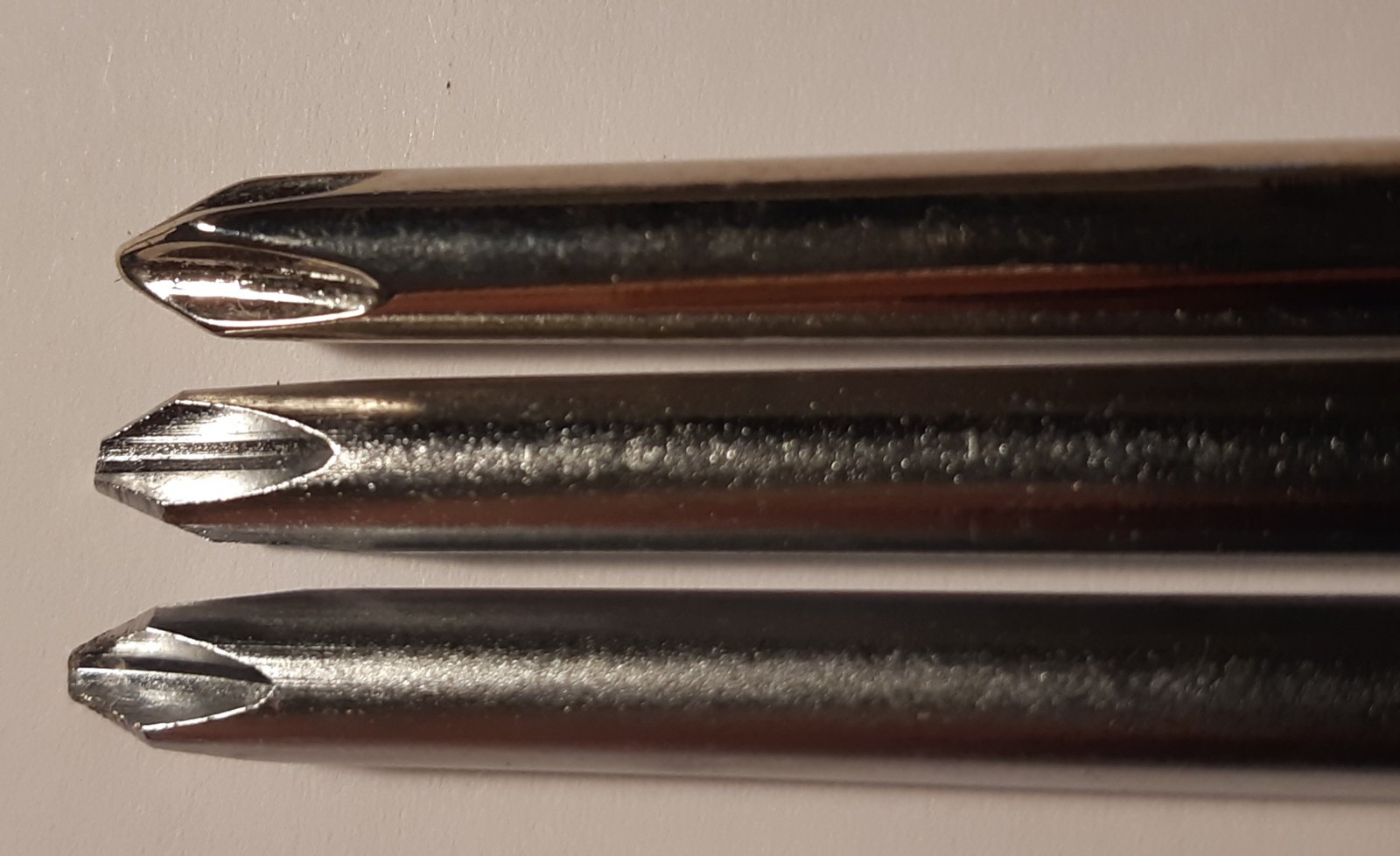 Chrome top vs 2 satin ones bottom.jpg