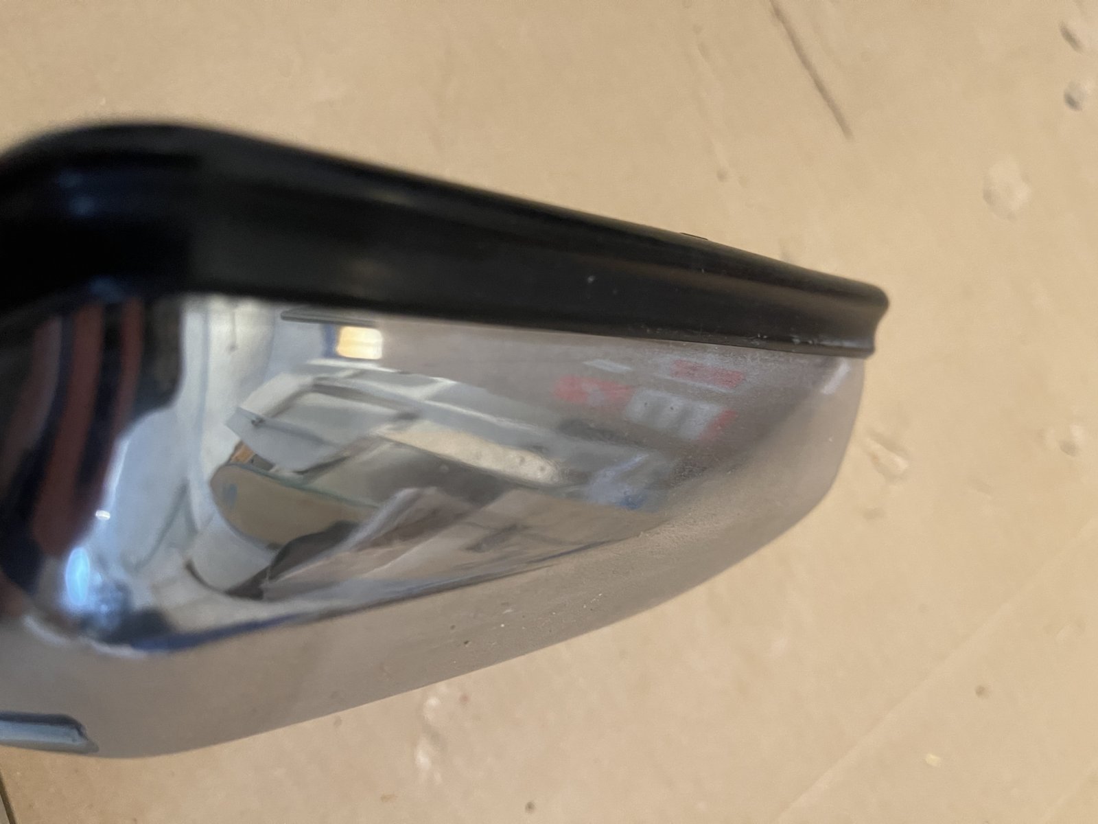 Coupe electric mirror top chrome close up.JPG