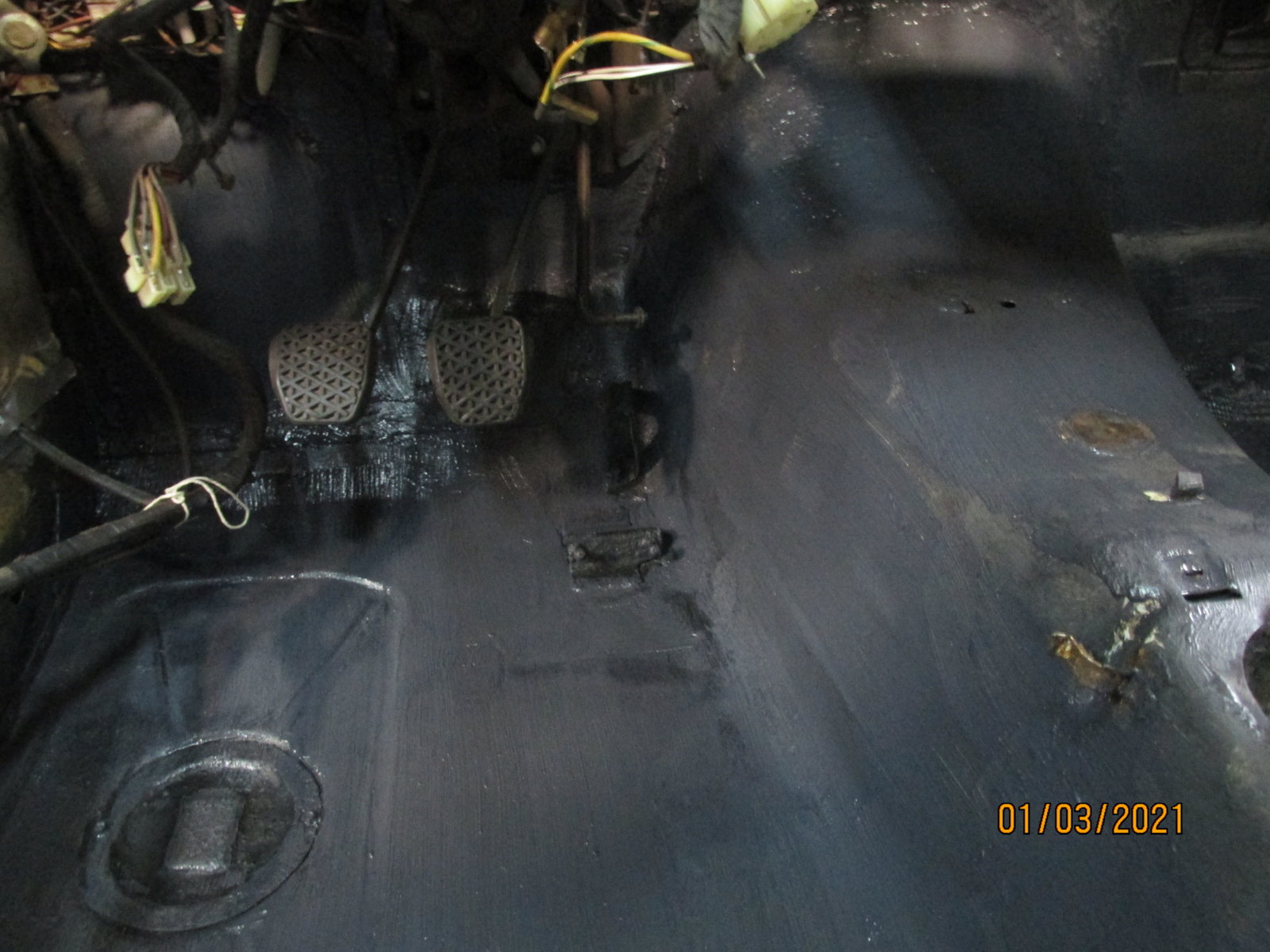 Drive side treated with second skin Firewall.JPG
