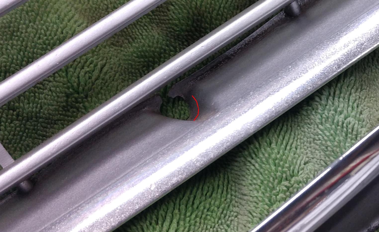 grille hole broken.jpg