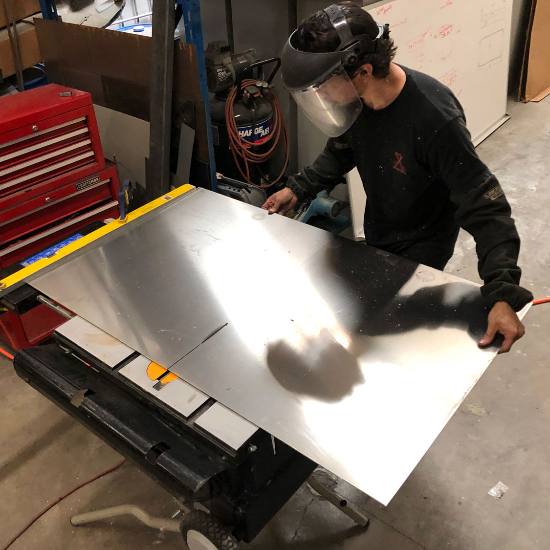 Aluminum cuts smooth and easy on a tablesaw as f it were a piece of thin plywood.