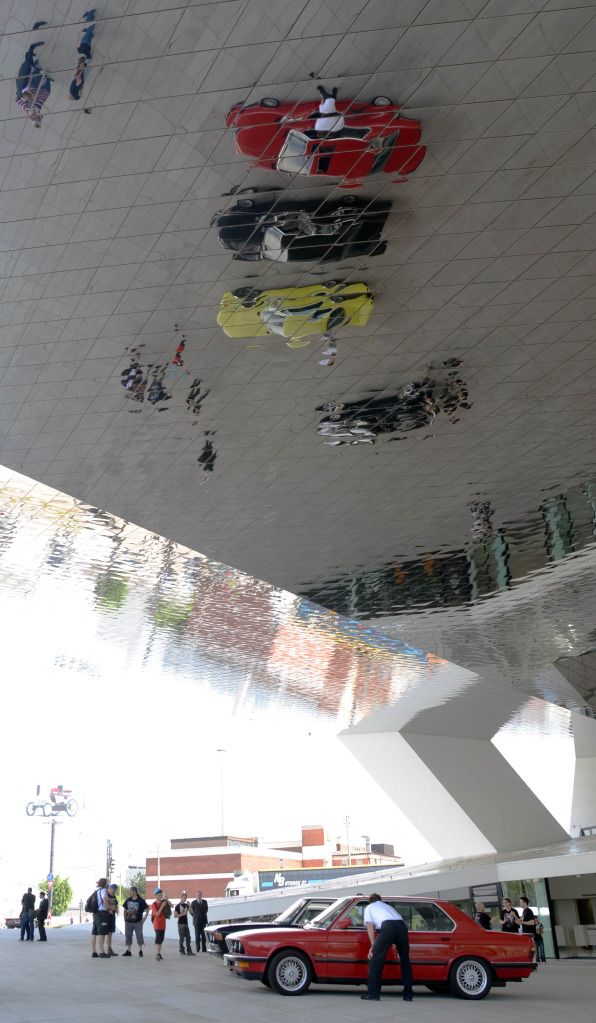 reflectionsinthePorschemuseumroof.jpg